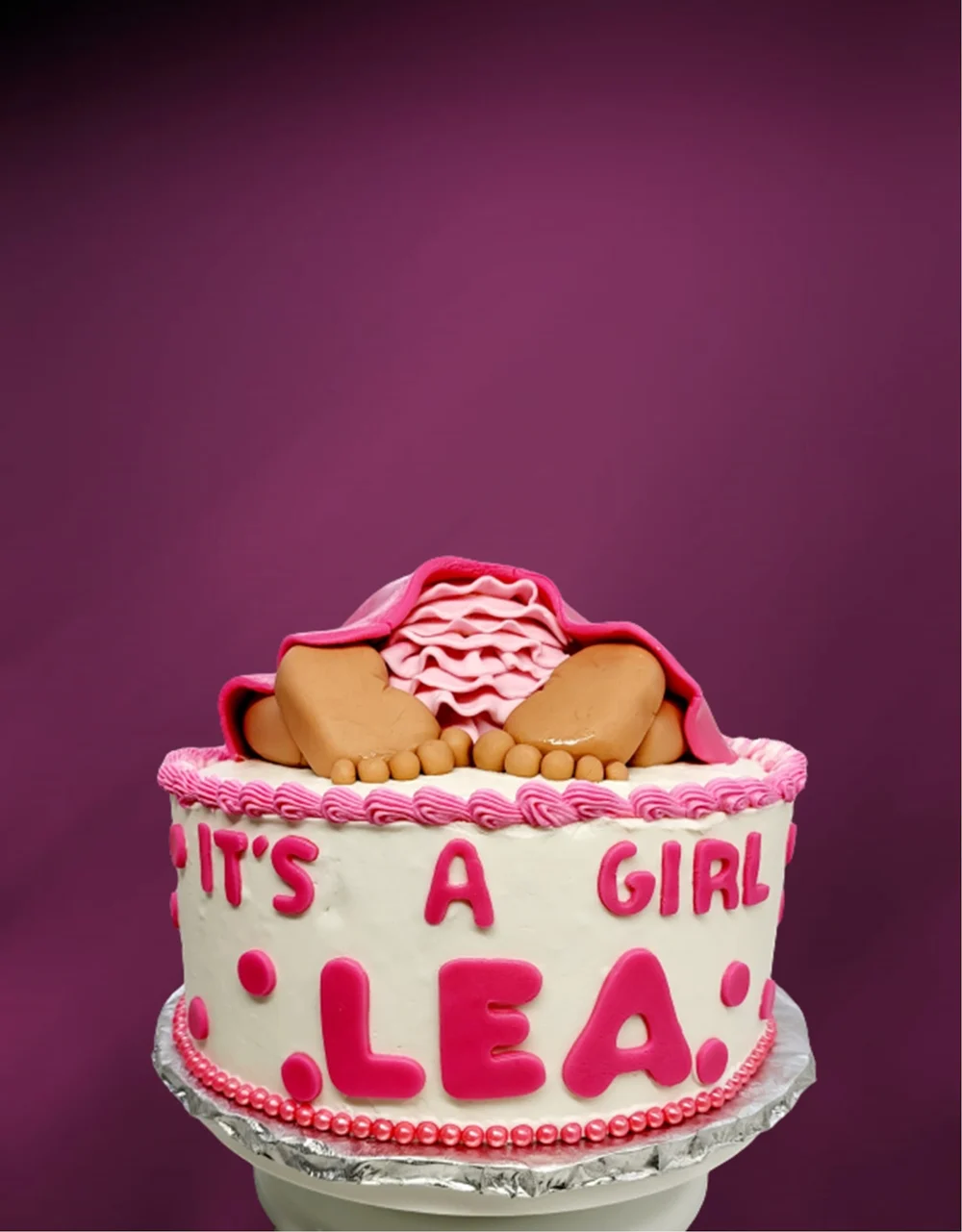 Bizcocho rosa de baby shower, hecho por Damaris